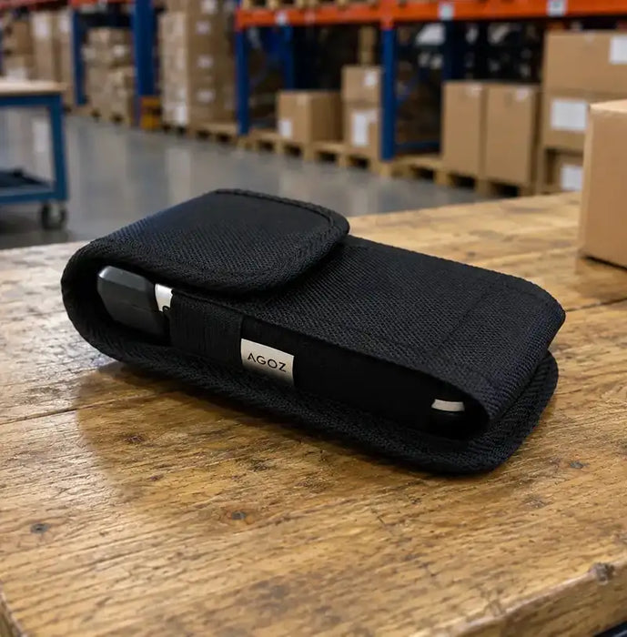 Rugged Datalogic handheld case on a warehouse workstation with the device secured inside for daily logistics workflows.