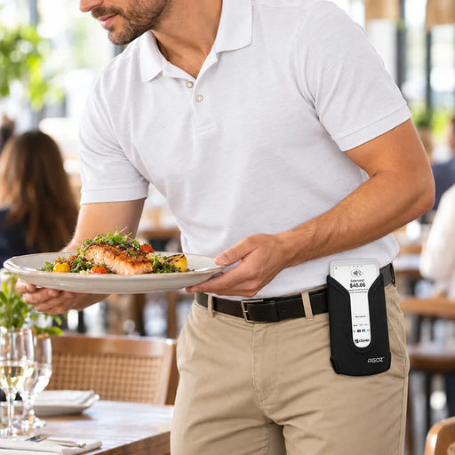 Restaurant server carrying a plated meal while wearing an Agoz Clover Flex POS holster attached to his waist belt, demonstrating hands-free terminal storage.
