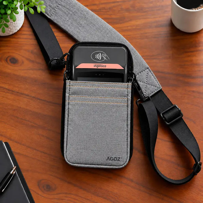Ingenico POS payment terminal in a gray Agoz holster with padded adjustable crossbody shoulder strap.