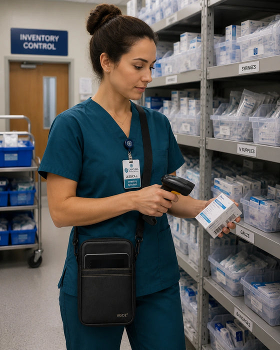 Nurse in teal scrubs wearing a Rhino tablet case in a hospital supply room.