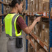 Warehouse worker scanning shelf barcode with Zebra TC58 scanner and AgozTech holster case