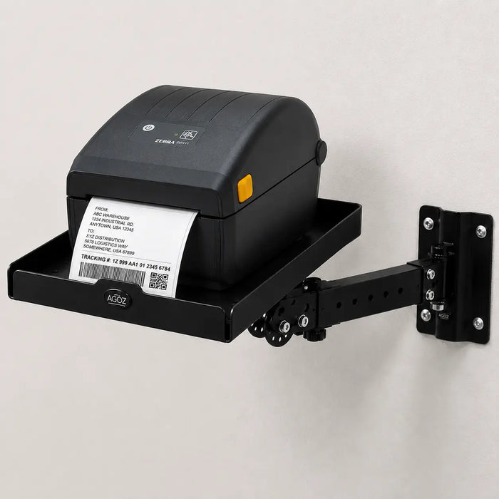 Black stainless steel Agoz wall-mounted shelf with swing arm supporting a Zebra ZD621 direct thermal label printer.