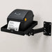 Black stainless steel Agoz wall-mounted shelf with swing arm supporting a Zebra ZD621 direct thermal label printer.