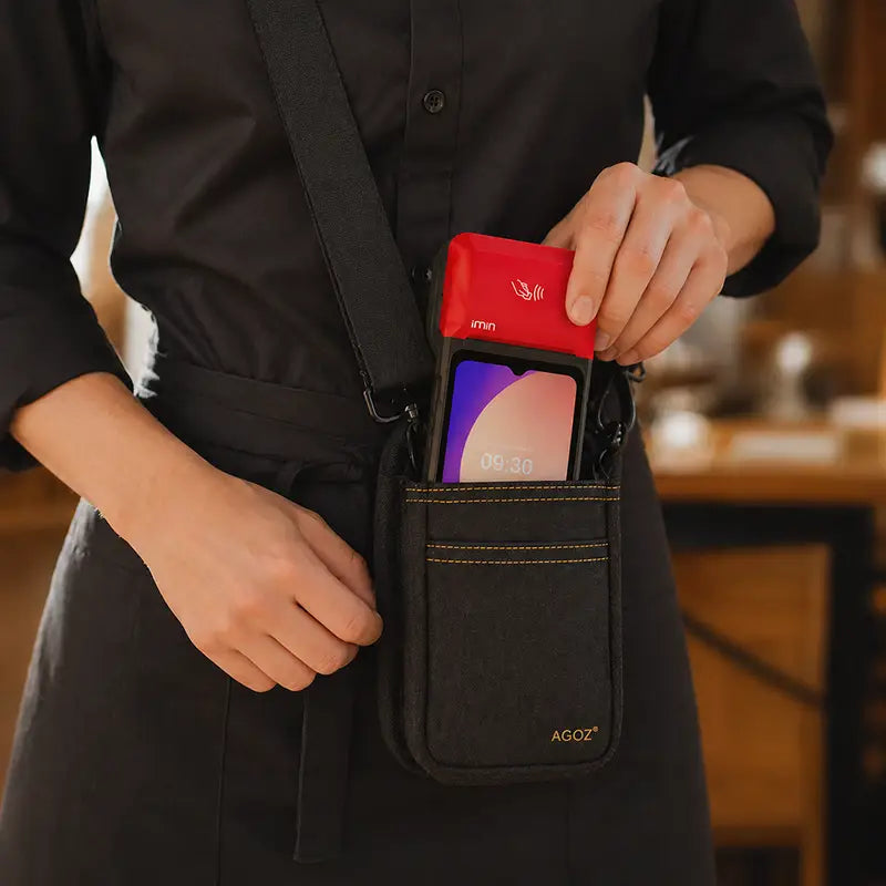 Restaurant server wearing an AgozTech crossbody sling pouch holding an iMin Handheld POS terminal.