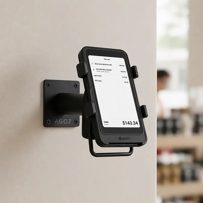 Shopify POS terminal secured in AgozTech wall mount swivel stand in retail setting