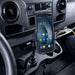 Urovo mobile computer secured in a cup holder vehicle cradle mount inside a commercial vehicle console.